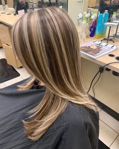 Dark hair chunky blonde highlights - Chunky Highlights . Give your dark hair dimension by layering in swaths of caramel and blonde color throughout. Chunky highlights have made a comeback, and it’s no surprise why. The hair …